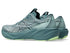 mens asics GT 2000 15 in a dark cyan blue colour with lighter green details on the sole of the shoe. featuring adaptive support that activates exactly when you need it, keeping your stride smooth and balanced without feeling restrictive.