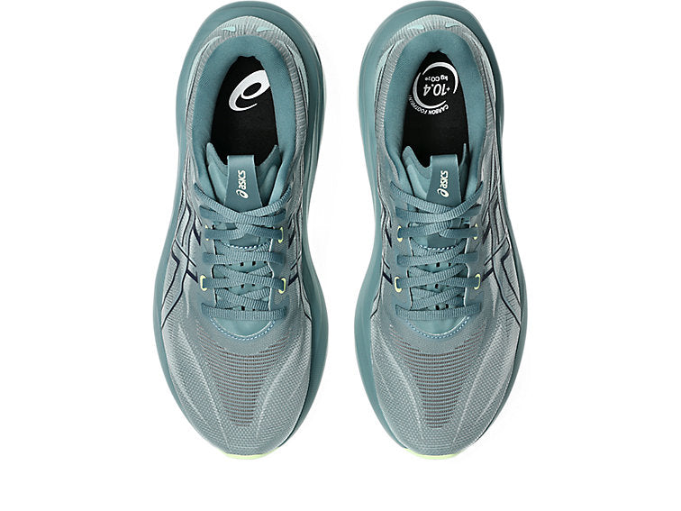 mens asics GT 2000 15 in a dark cyan blue colour with lighter green details on the sole of the shoe. featuring adaptive support that activates exactly when you need it, keeping your stride smooth and balanced without feeling restrictive.