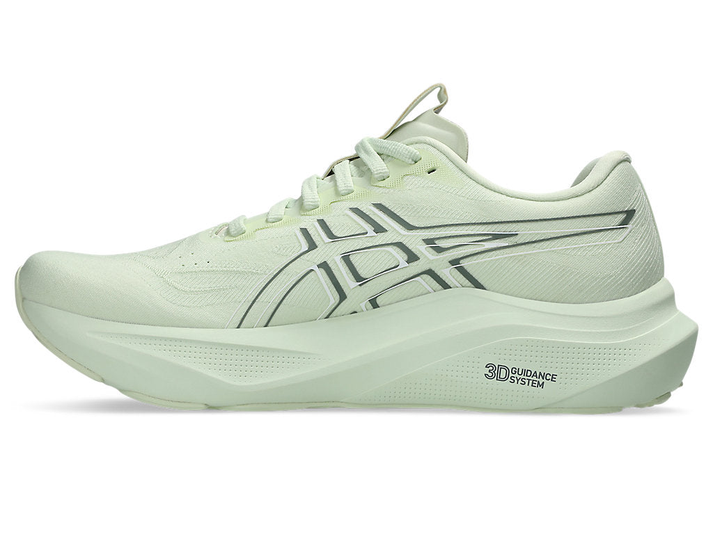 Inner side view of womens asics gt-2000 green blue road suppportive running shoe