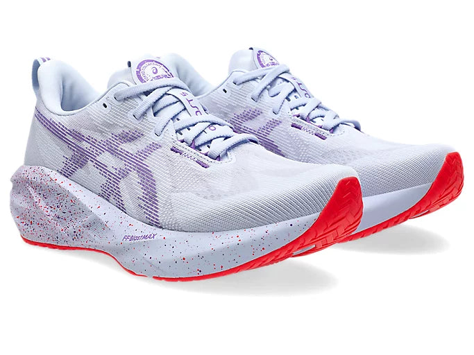 purple asics novablast running shoes with red sole and speckle details