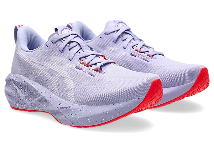 Pair of purple asics novablast running shoe for women with red sole