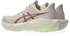 asics novablast 6, lightweight bouncy road running shoe with high energy return, grey and beige colour with brown and neon green details, back angle of shoes with focus on heels