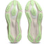 asics novablast 6, lightweight bouncy road running shoe with high energy return, light beige colour with neon green details, soles of shoe