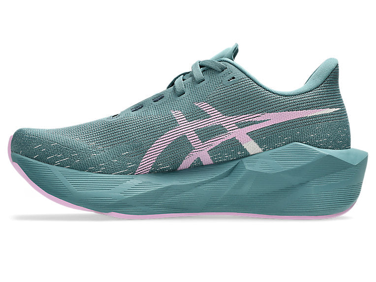 asics novablast 6 womens, lightweight bouncy road running shoe with high energy return, teal colour with lilac green details, side profile of shoe