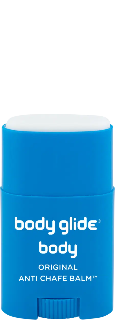 Blue stick of body glide anti-chafe balm on a white background