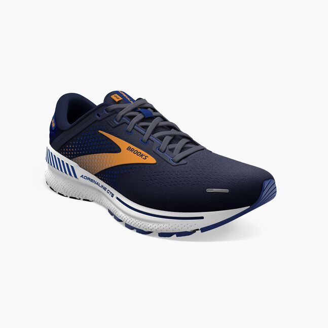Navy brooks adrenaline gts 22 running shoe with orange accents on a white background