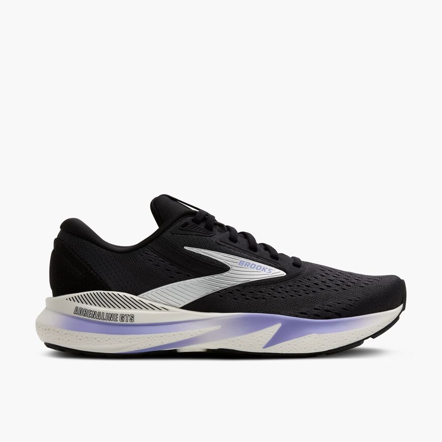 brooks adrenaline gts 24 for women, cushioned supportive running and walking shoe, black colour with silver logo white sole and purple details, side profile of shoe