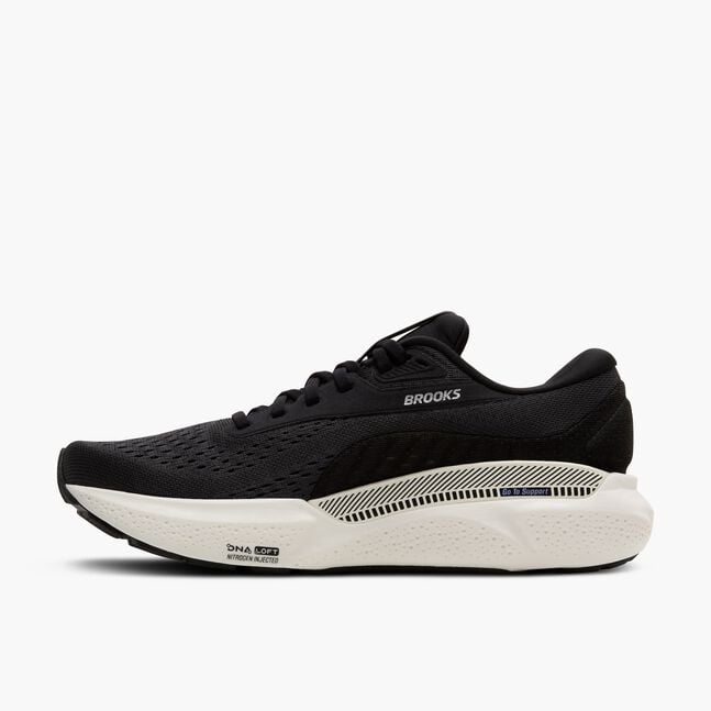 brooks adrenaline gts 24 for women, cushioned supportive running and walking shoe, black colour with silver logo white sole and purple details, inside profile of shoe with 'go to support' details
