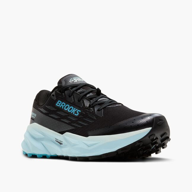Brooks cascadia 19 GTX, waterproof trail running and walking shoe, black shoe upper with light blue sole, angled profile of shoe