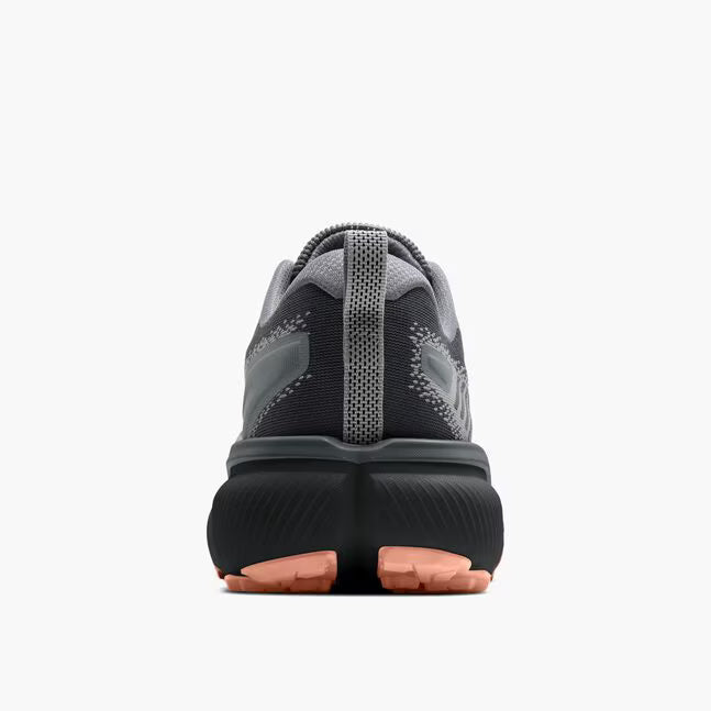 brooks cascadia 20 for women, road to trail gravel running and walking shoe, dark grey and black with peach detail, heel of shoe