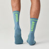 back view of brooks cascadia crew trail running socks in a blue colour with yellow accents and white brooks branding