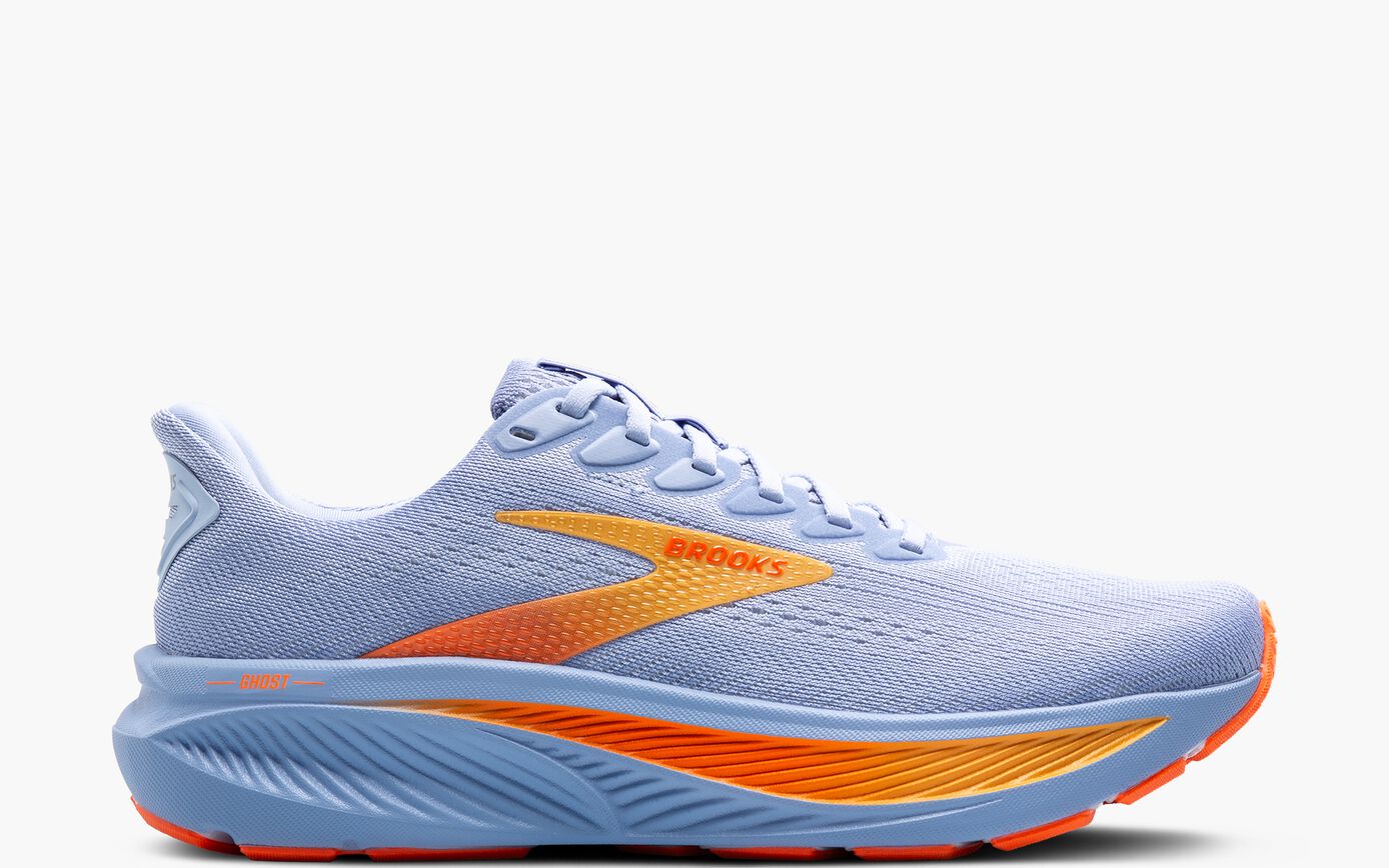 Light blue brooks ghost running shoe with orange accents on a white background