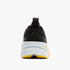 brooks ghost max 4 for women, long distance recovery or training running shoe with maximum protective cushioning, black with white and peach with yellow brooks logo, back heel of shoe
