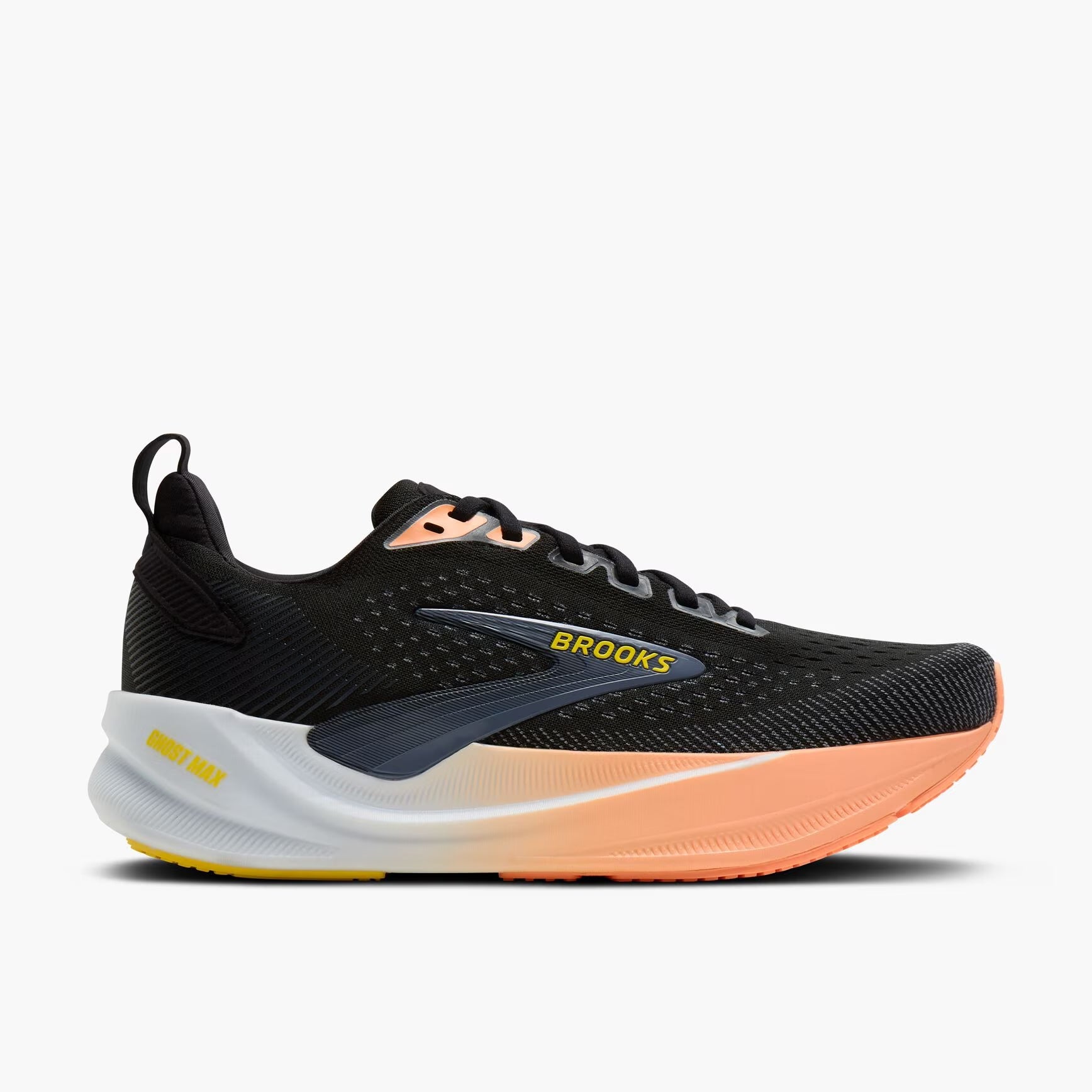 brooks ghost max 4 for women, long distance recovery or training running shoe with maximum protective cushioning, black with white and peach with yellow brooks logo, side profile of shoe