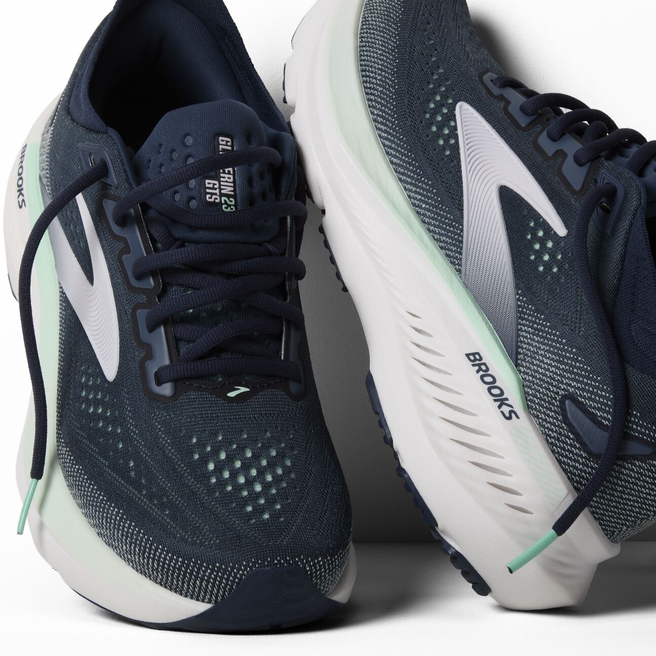 pair of running shoes for women, supportive cushioned road running shoe, glycerin gts navy colour