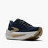 brooks glycerin max, bouncy, energetic, max cushioned daily trainer. navy upper with white sole and gold details. outside front side view.