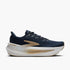 brooks glycerin max, bouncy, energetic, max cushioned daily trainer. navy upper with white sole and gold details. outside side view.
