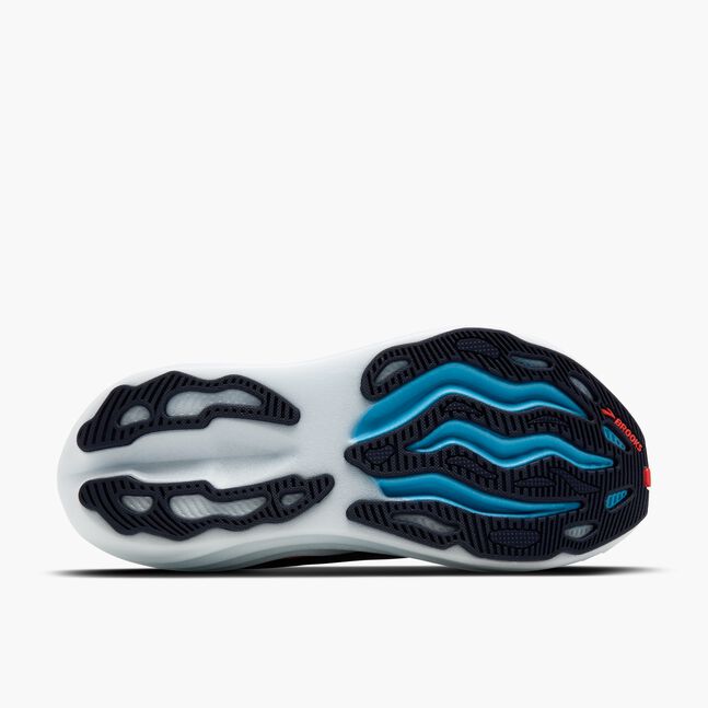 brooks glycerin max for women, maximum cushioning running shoe for recovery runs and long distances, navy colour with white sole and pink 'brooks' logo, underside of shoe