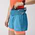 Brooks High Point Women's Trail Shorts with pockets and storage, blue and orange