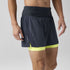 Man wearing Brooks High Point 2in1 trail shorts for men black and yellow colour