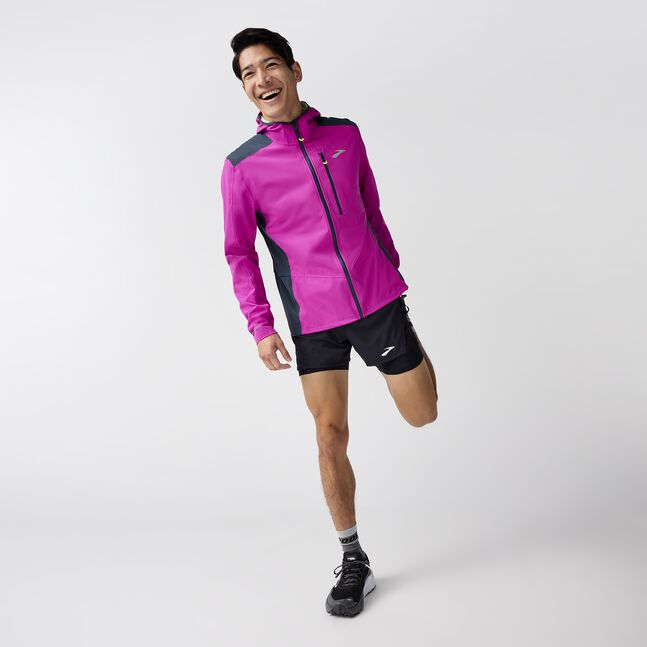 Man wearing brooks high point waterproof running jacket 2.0 purple