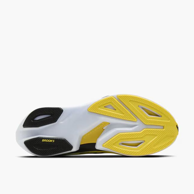Bottom view of brooks hyperion max cushioning road running shoe in a white and yellow colour