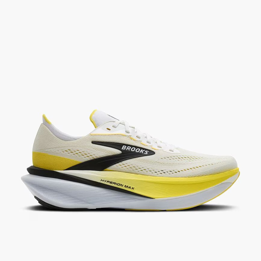 Side view of brooks hyperion max cushioning road running shoe in a white and yellow colour