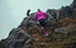 Woman and man running on the mountains in brooks high point trail running gear