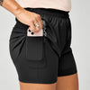 brooks cascadia 2-in-1 short, lightweight running short with pockets for women, black colour with white brooks logo, close up of phone storage pockets on brooks shorts on a white background