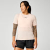 brooks womens high point short sleeve 2.0, super lightweight and breathable trail running top, light pink colour, woman wearing brooks top with grey background