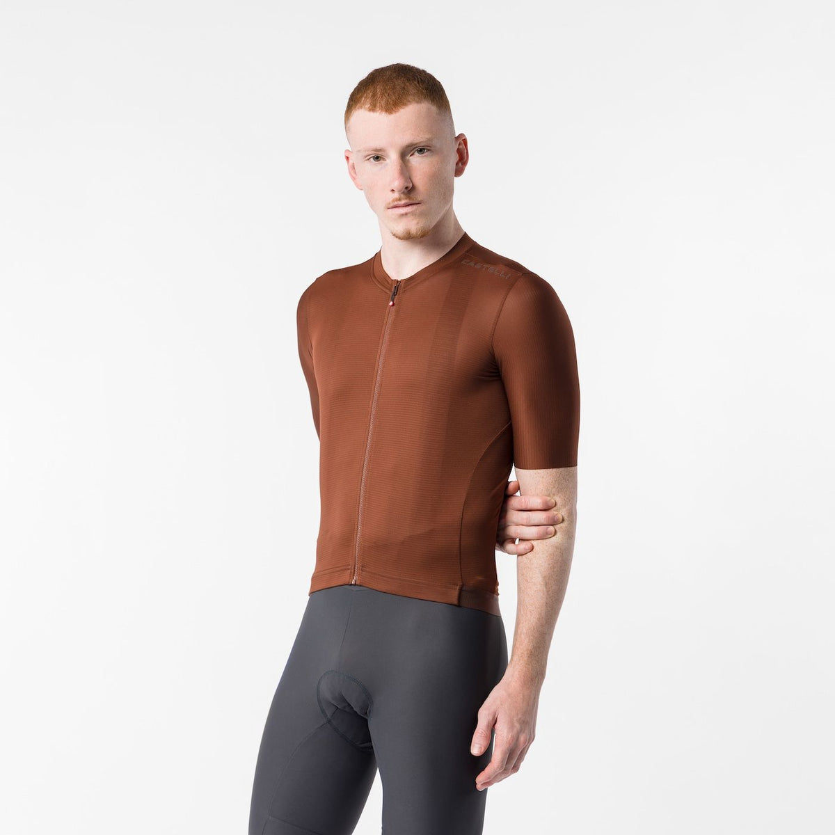 man wearing castelli espresso 2 jersey, clay colour