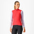 Woman wearing a Castelli Espresso Vest in hibiscus red, showing front