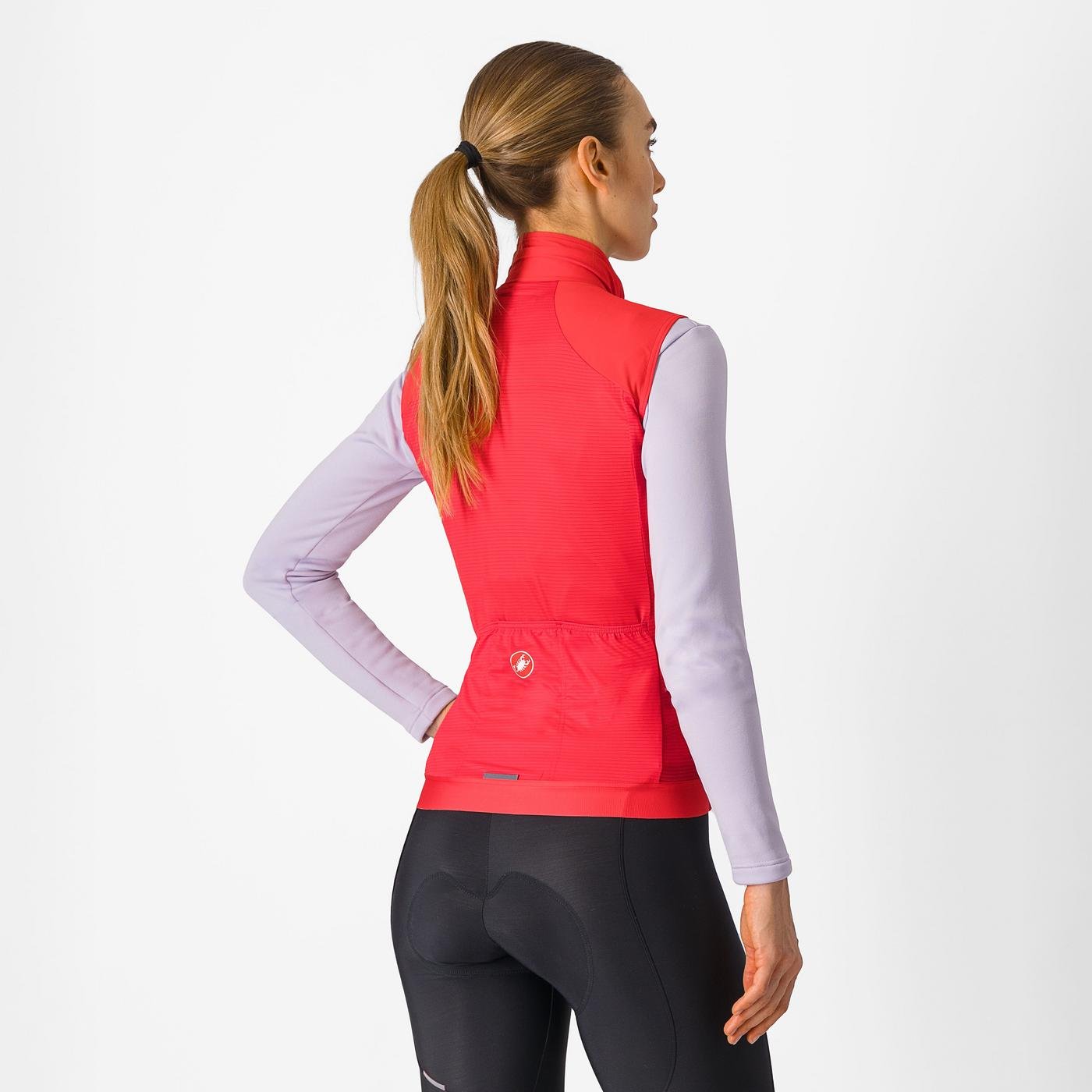 Woman wearing a Castelli Espresso Vest in hibiscus red, showing back