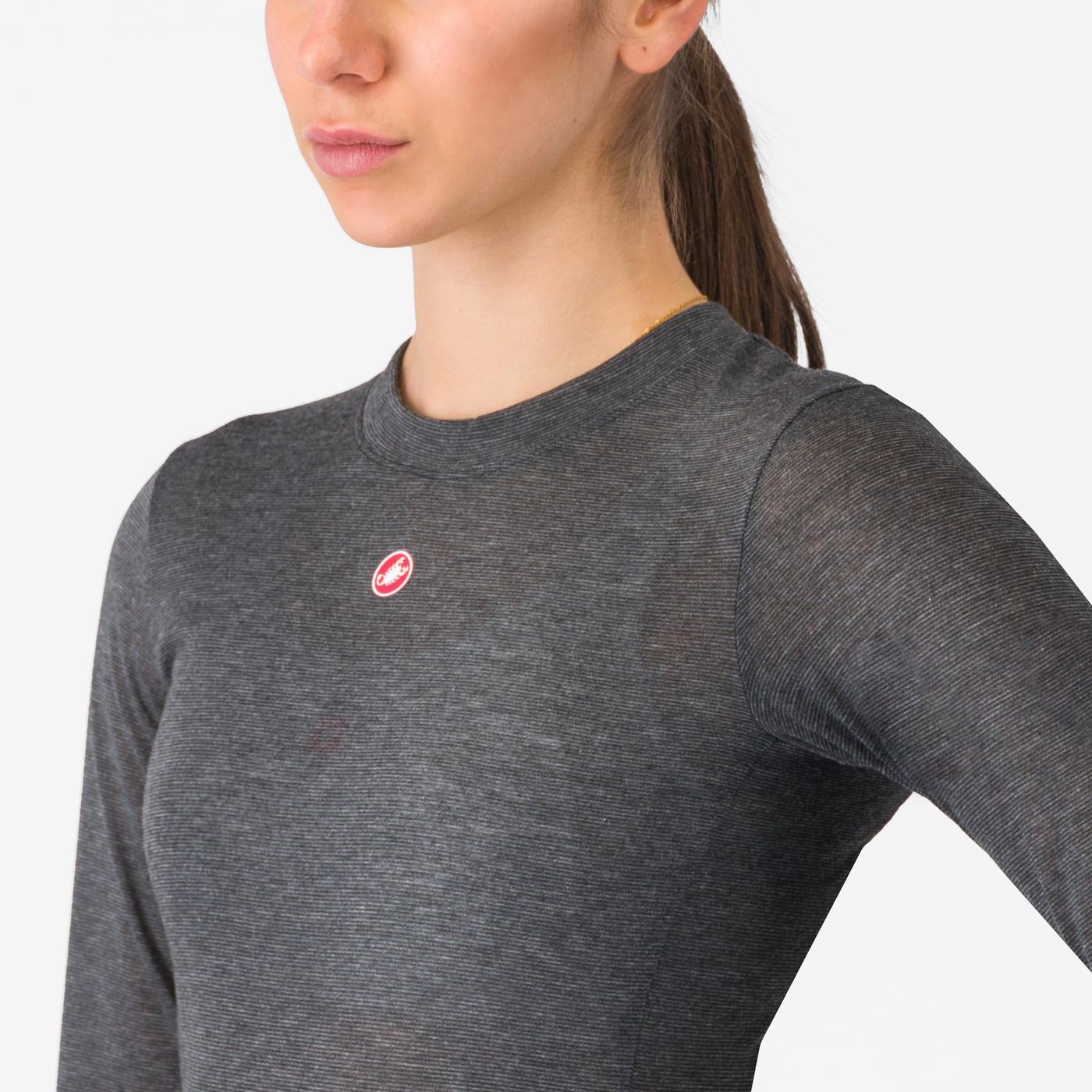 woman wearing castelli medio base layer with castelli bibtights