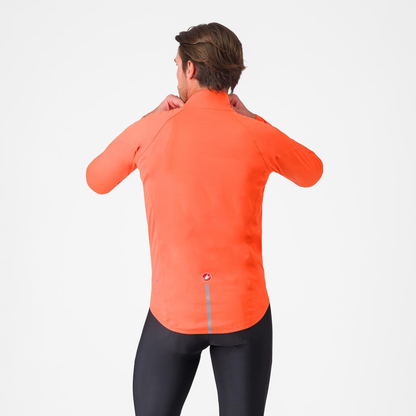 Man wearing Castelli Emergency 3 waterproof cycling jacket showing back 