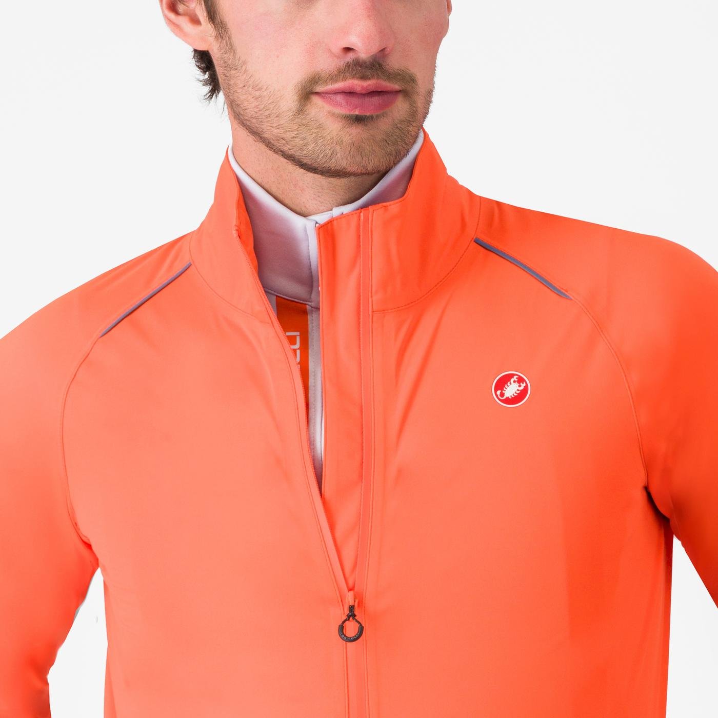 Man wearing Castelli Emergency 3 waterproof cycling jacket showing close up of neck and zip