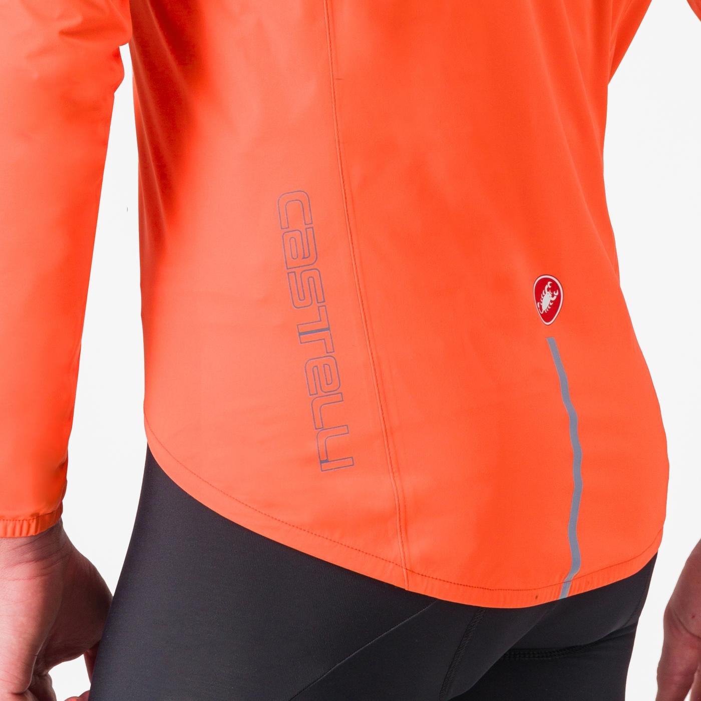 Man wearing Castelli Emergency 3 waterproof cycling jacket showing hi-vis and back coverage