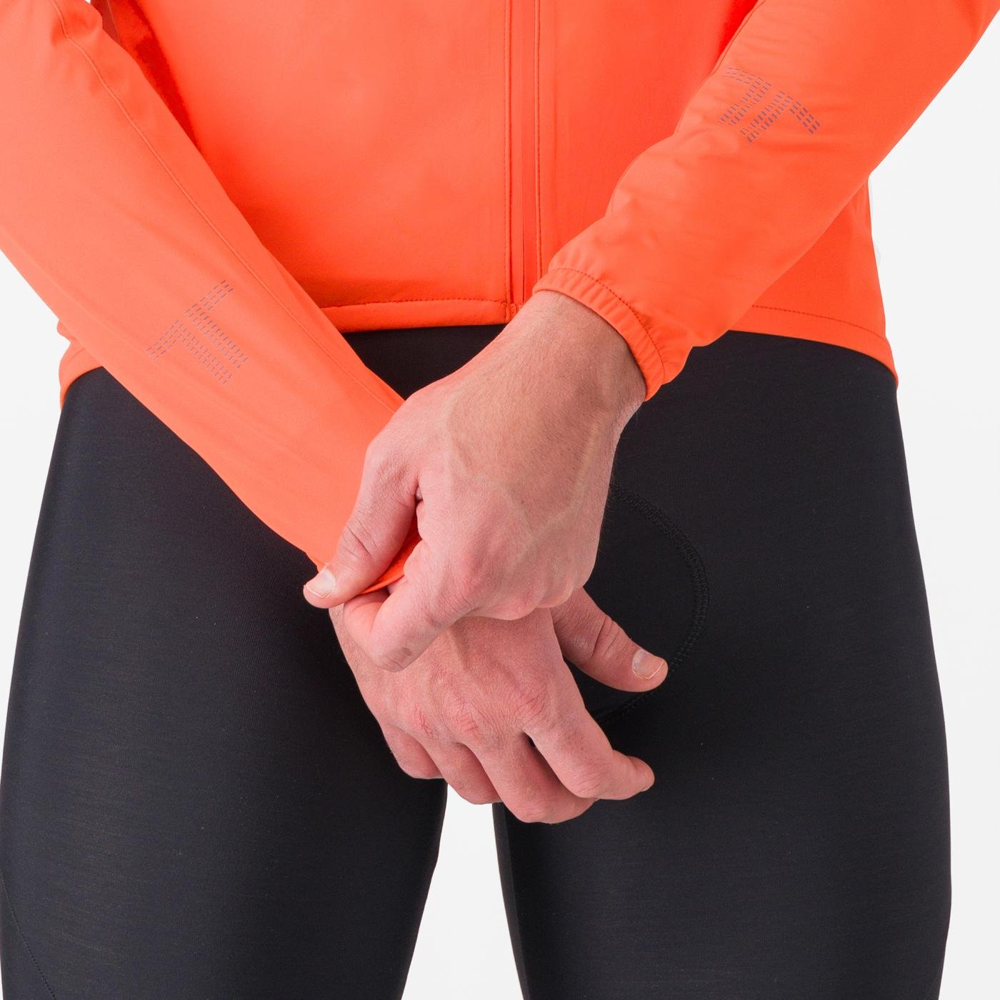 Man wearing Castelli Emergency 3 waterproof cycling jacket showing sleeves and cuffs