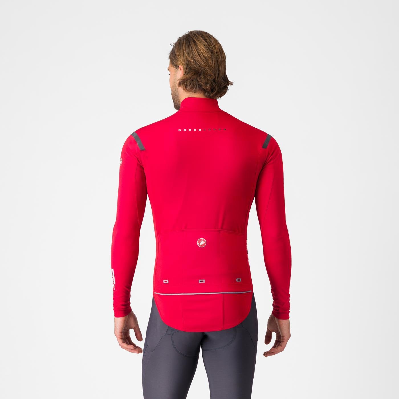 castelli perfetto ros 3 jacket, water resistant windproof breathable cycling jacket, black colour with reflective grey details, man wearing castelli jacket from behind 