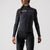 woman wearing light black castelli sinergia thermal cycling jacket, showing reflection and logo at front