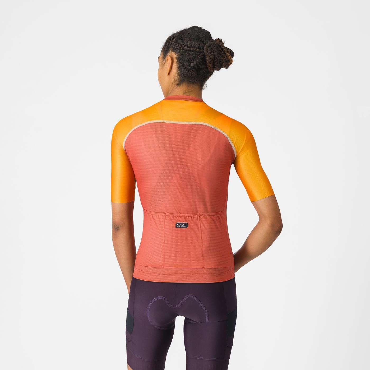 Castelli Unlimited 2 W Jersey, lightweight breathable womans cycling top, peach orange with bright orange sleeves and white details, woman wearing cycling top back profile