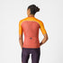 Castelli Unlimited 2 W Jersey, lightweight breathable womans cycling top, peach orange with bright orange sleeves and white details, woman wearing cycling top back profile
