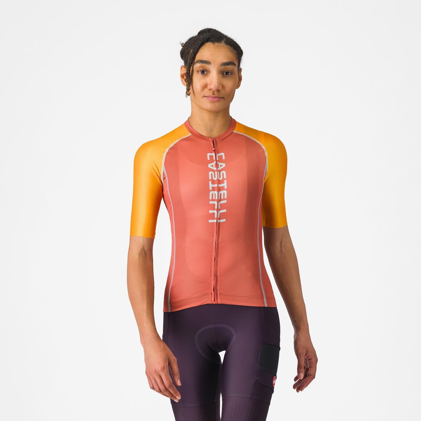 Castelli Unlimited 2 W Jersey, lightweight breathable womans cycling top, peach orange with bright orange sleeves and white details, woman wearing cycling top front profile
