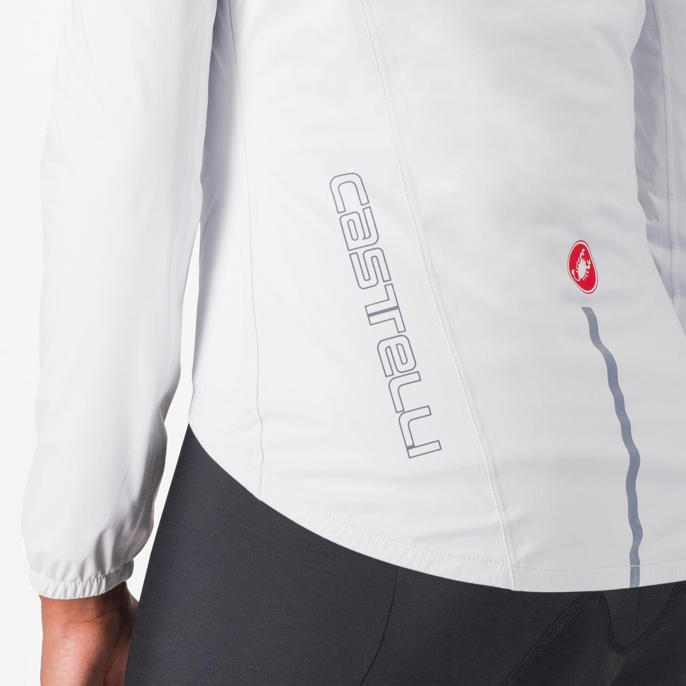 woman wearing castelli emergency 3 waterproof cycling jacket in white, showing reflective details and logo on back