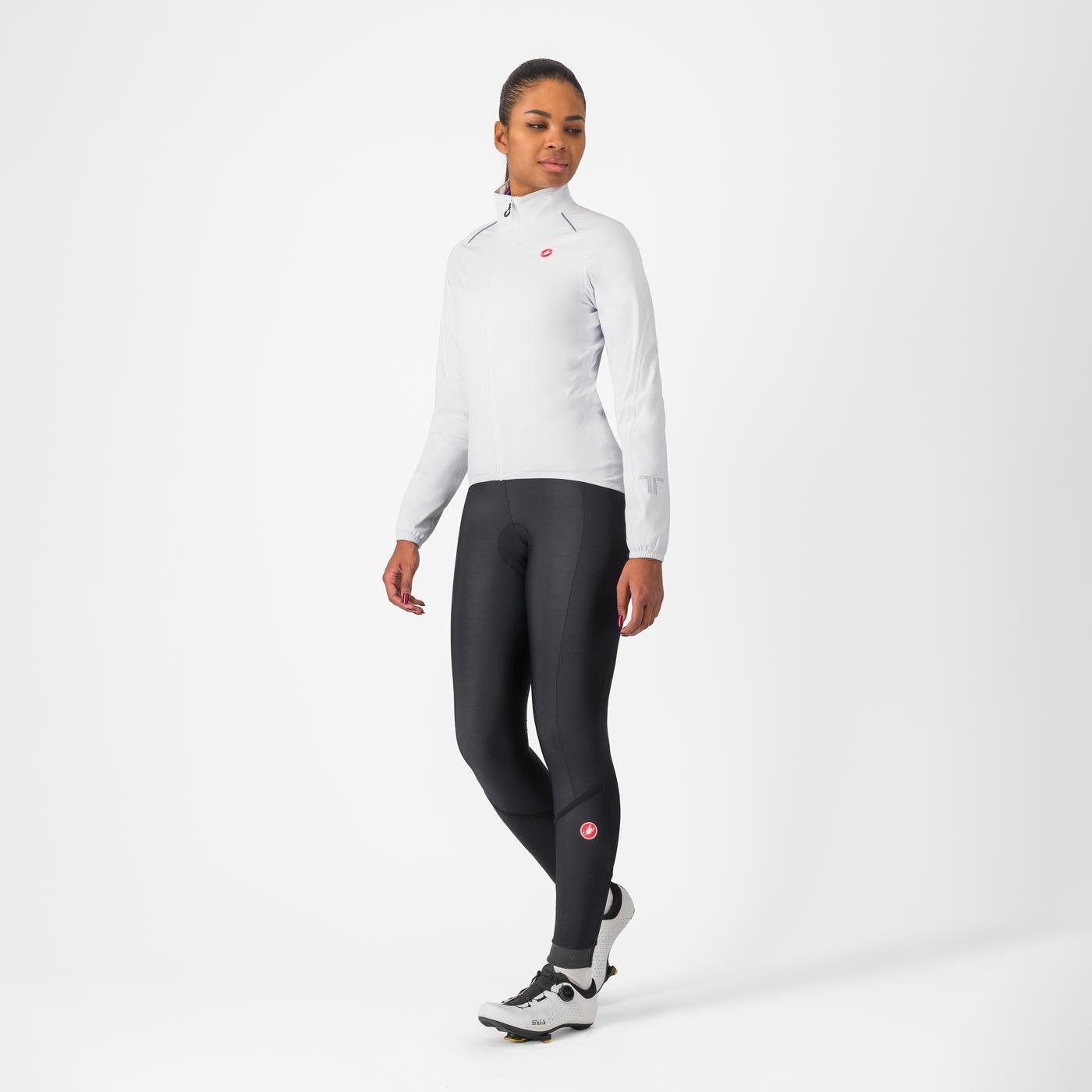 woman wearing castelli emergency 3 waterproof cycling jacket in white