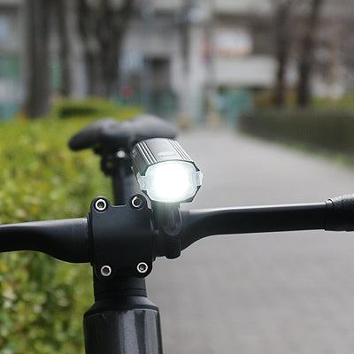 Black bicycle headlight CatEye 'AMPP 1300' 