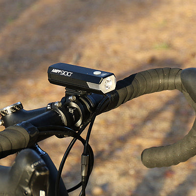 cateye ampp 900 bike light mounted on handlebars