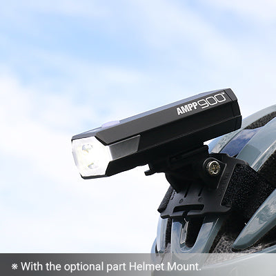 cateye ampp 900 bike light mounted on a helmet