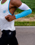 man running in compressport armforce armsleeves in blue and white