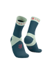 Pair of compressport ultra trail socks blue and teal socks with brand logo on a white background
